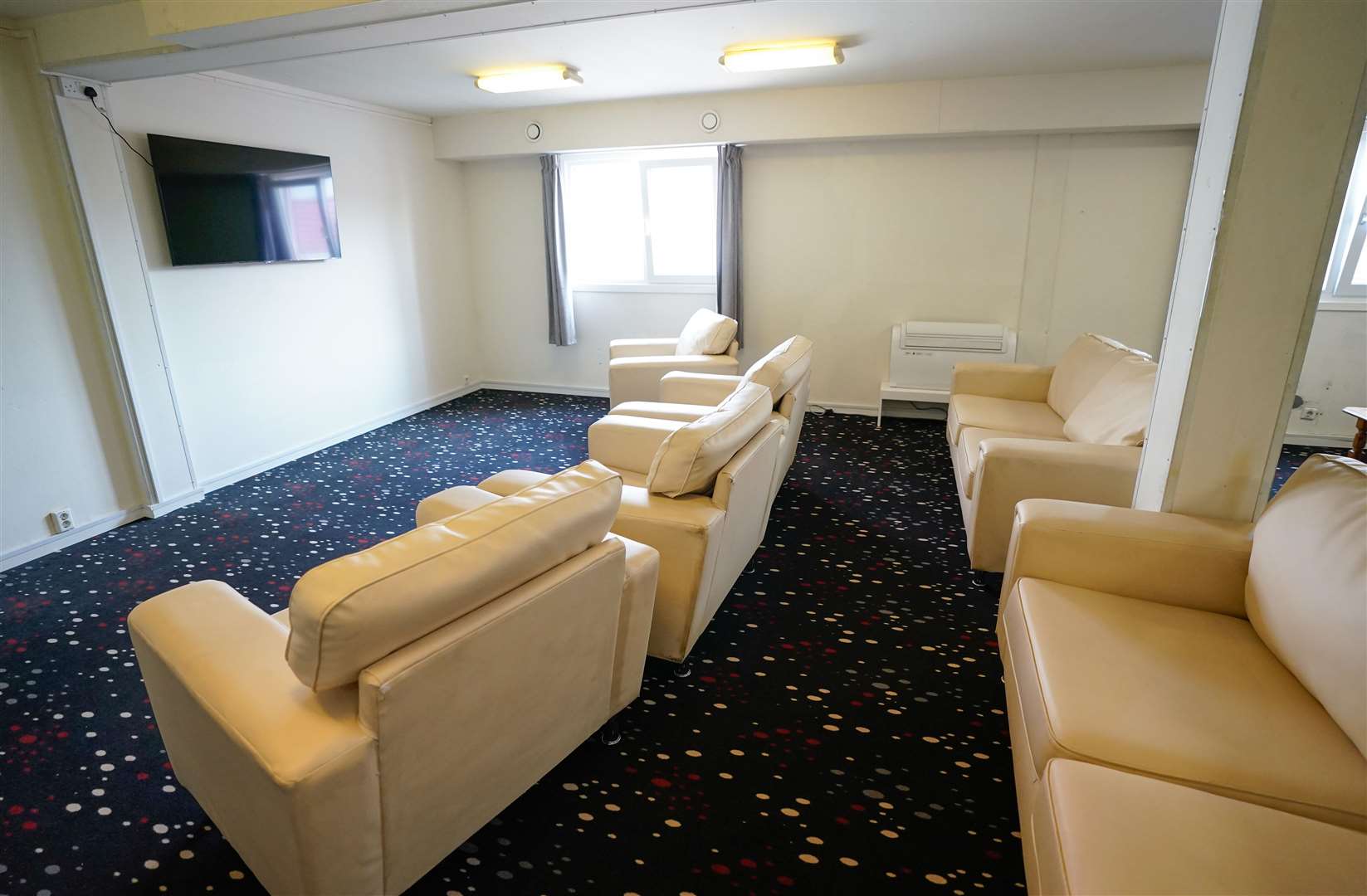 Residents will be encouraged to socialise or watch programmes and films in one of four communal TV rooms (Andrew Matthews/PA)