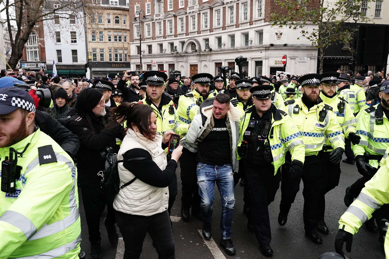 Former leader of the English Defence League Tommy Robinson was led away by police (Jordan Pettitt/PA)