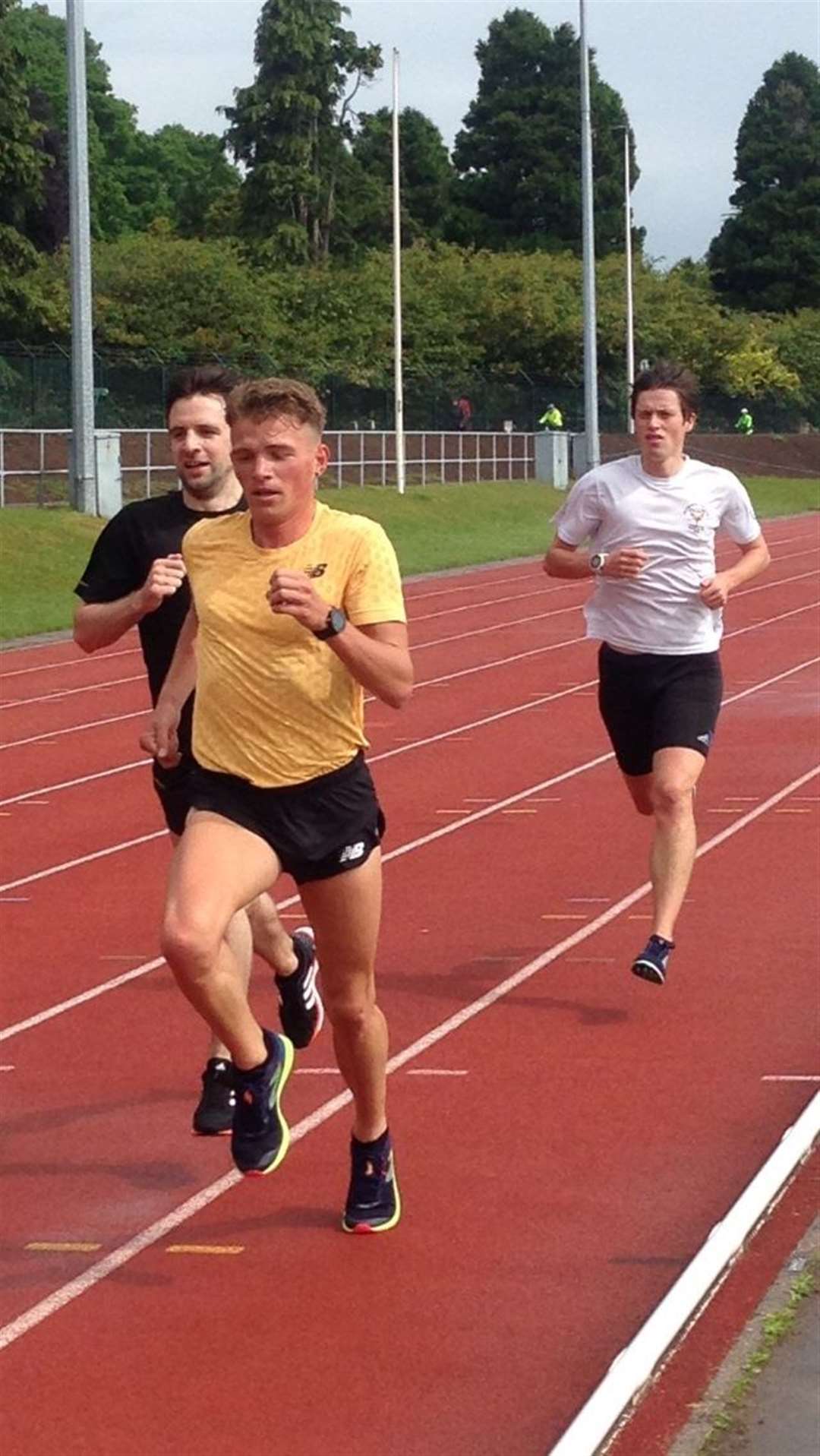 Stephen MacKay (right) and Forres Harrier Mark Mitchell (left) training at Queen's Park in Inverness with Andrew Butchart in 2017.