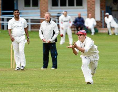 Highland v Northern Counties, Dave Dugdale of Counties takes the catch and wicket of Varun Natarajan.