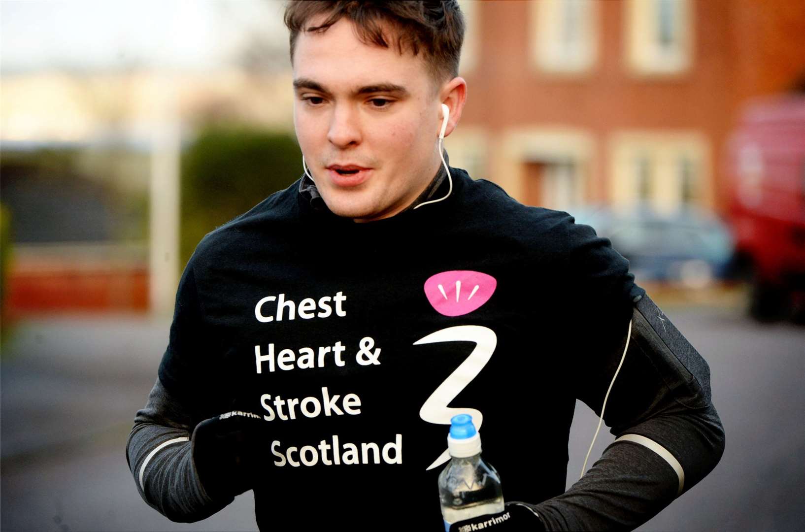 Kieran Fraser runs a marathon on Christmas Eve to raise money for Chest Heart and Stroke Scotland after his dad, Neil Fraser, suffered a severe stroke..Kieran Fraser starting his marathon..Picture: James Mackenzie..