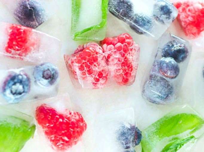 Add some fruit to your ice cube trays for future fresh garnish straight from the freezer.