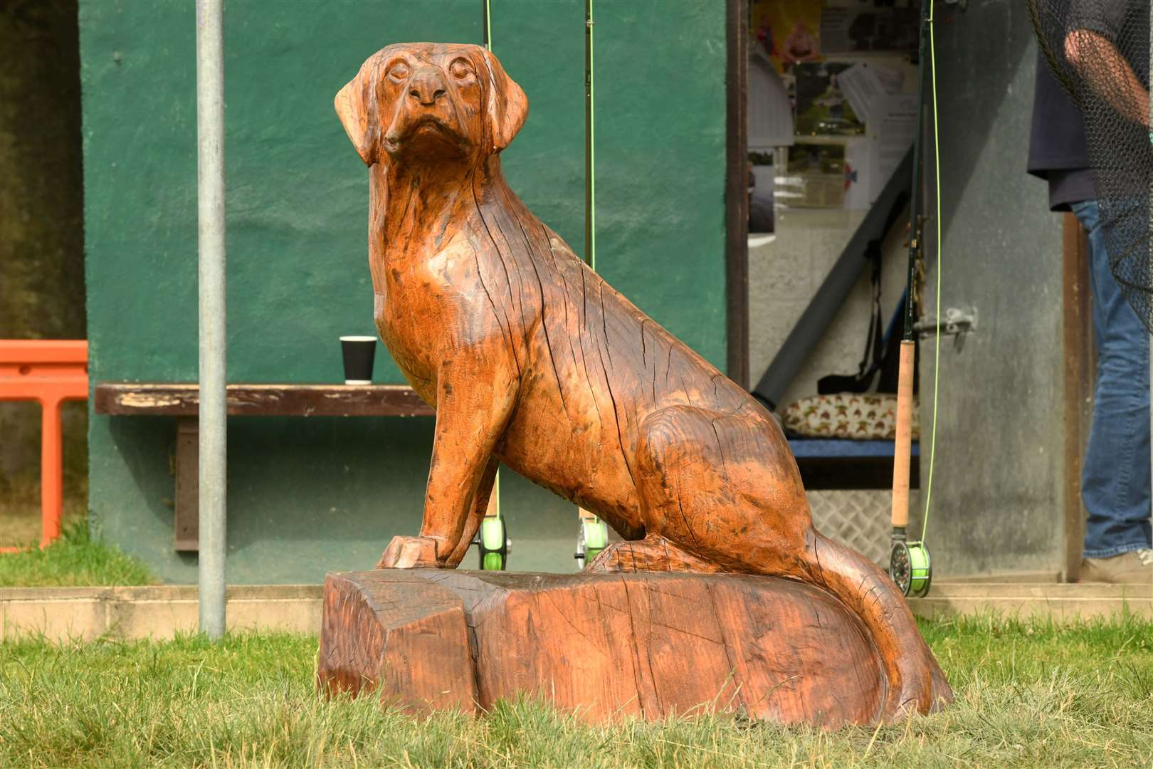 The dog carving in front of The Little Isle fishing shed. Picture: James Mackenzie.