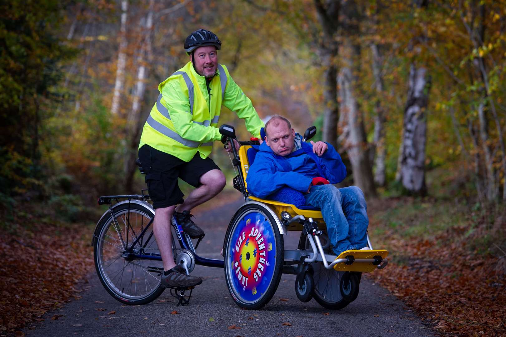 Mark Forbes has released a single to raise money to buy a special e-bike for his disabled brother-in-law James Murray. Picture: Callum Mackay