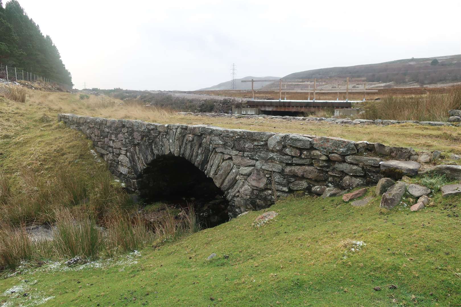 The Wade bridge - or its subsequent replacement - alongside a recent bridge used for forestry work.