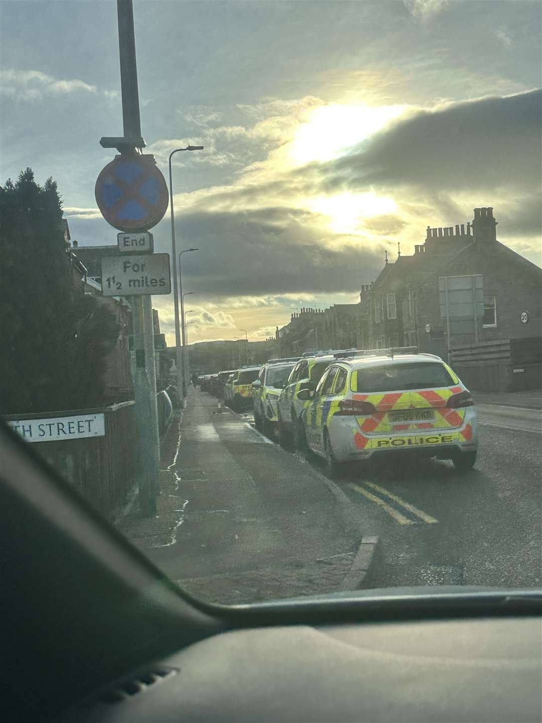 Police cars and officers in Kenneth Street, Inverness.
