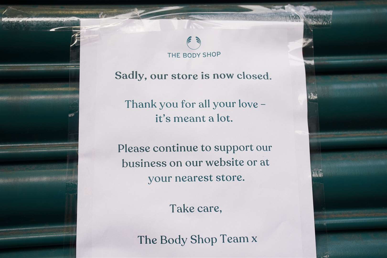 A sign on the shutters at The Body Shop store in Oxford Street, central London (Lucy North/PA)