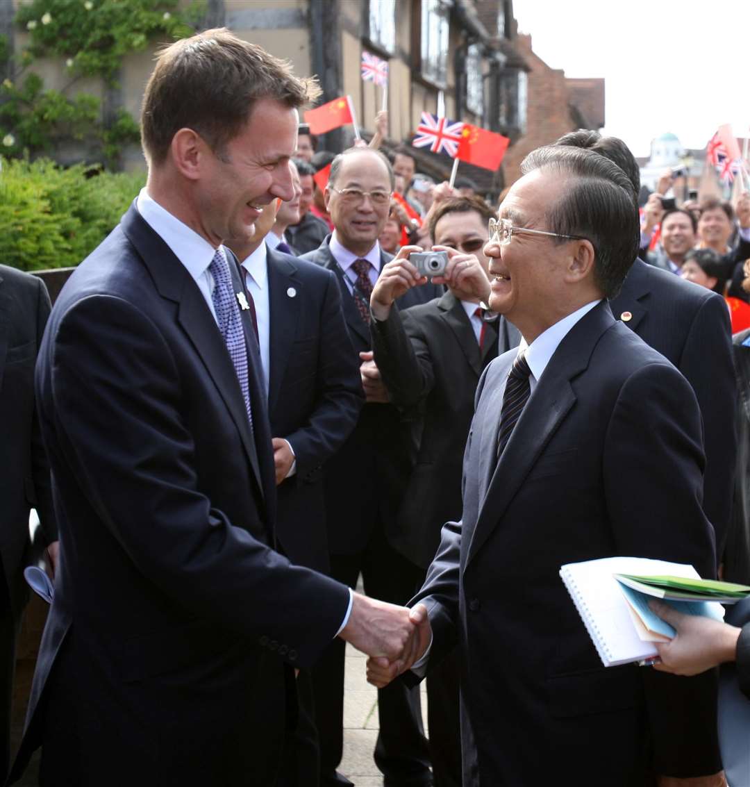 Chinese premier Wen Jiabao is greeted by Culture Secretary Jeremy Hunt at the Shakespeare Centre in Stratford-upon-Avon in June 2011 (Chris Radburn/PA)