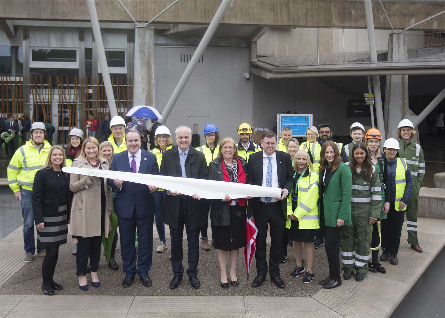 Scottish Renewables chief executive Claire Mack; ScottishPower Renewables chief executive Lindsay McQuade; Scotland’s energy minister Paul Wheelhouse; MSP Mark Ruskell; MSP Elaine Smith; MSP Colin Smyth; Jacqueline Aitken, of Senvion; and Susie Lind, of EDF Renewables join renewables workers at the Scottish Parliament during Onshore Wind Week. Picture: Michael McGurk
