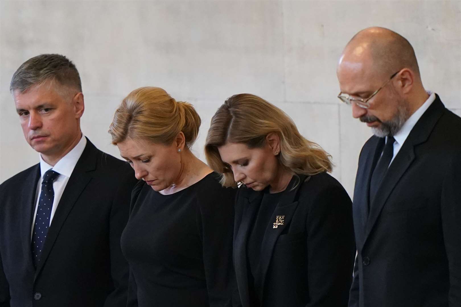 Olena Zelenska (second right) views the Queen’s coffin in Westminster Hall (Joe Giddens/PA)