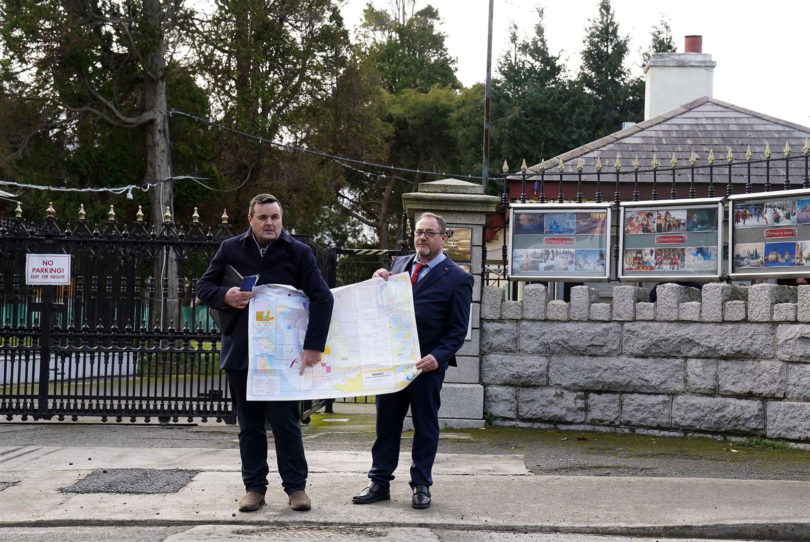 Brendan Byrne and Mr Murphy with a Fisheries Management Chart outside the Russian Embassy in Dublin (Brian Lawless/PA)