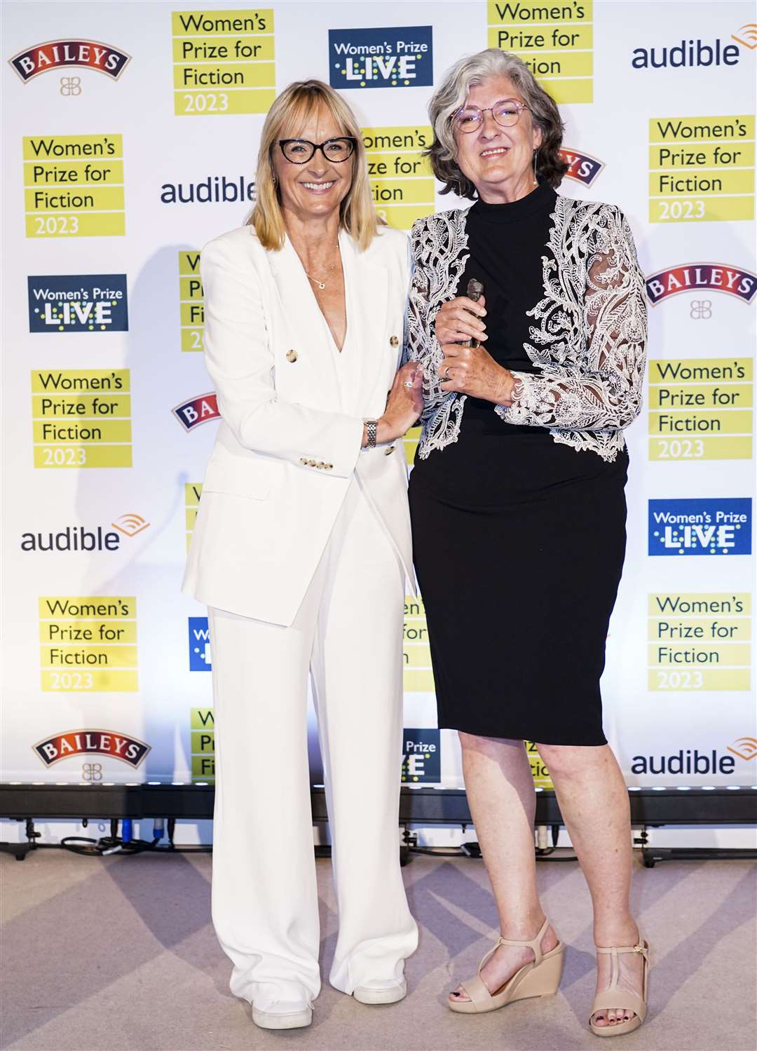 Chairwoman of the Women’s Prize for Fiction judging panel Louise Minchin and winner Barbara Kingsolver (Ian West/PA Wire)