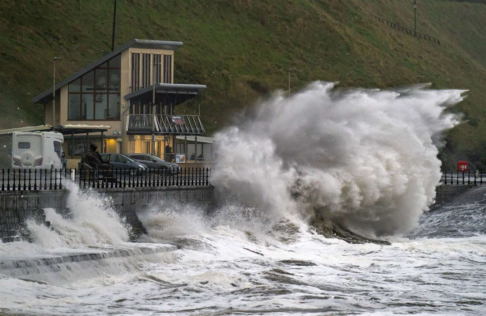 Waves crash over the promenade in Scarborough during the storm (Danny Lawson/PA)