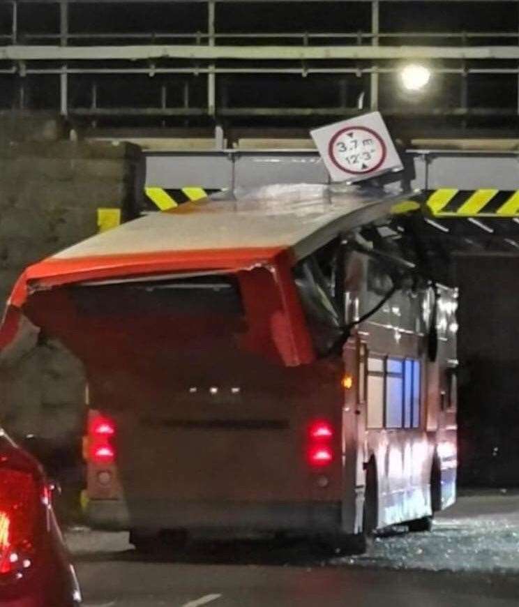 Bus hits bridge in Inverness.
