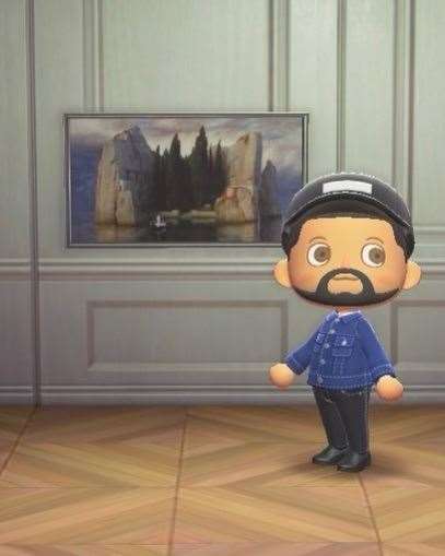 May Naidoo’s avatar in Animal Crossing in front of the Isle of the Dead painting (May Naidoo/PA)