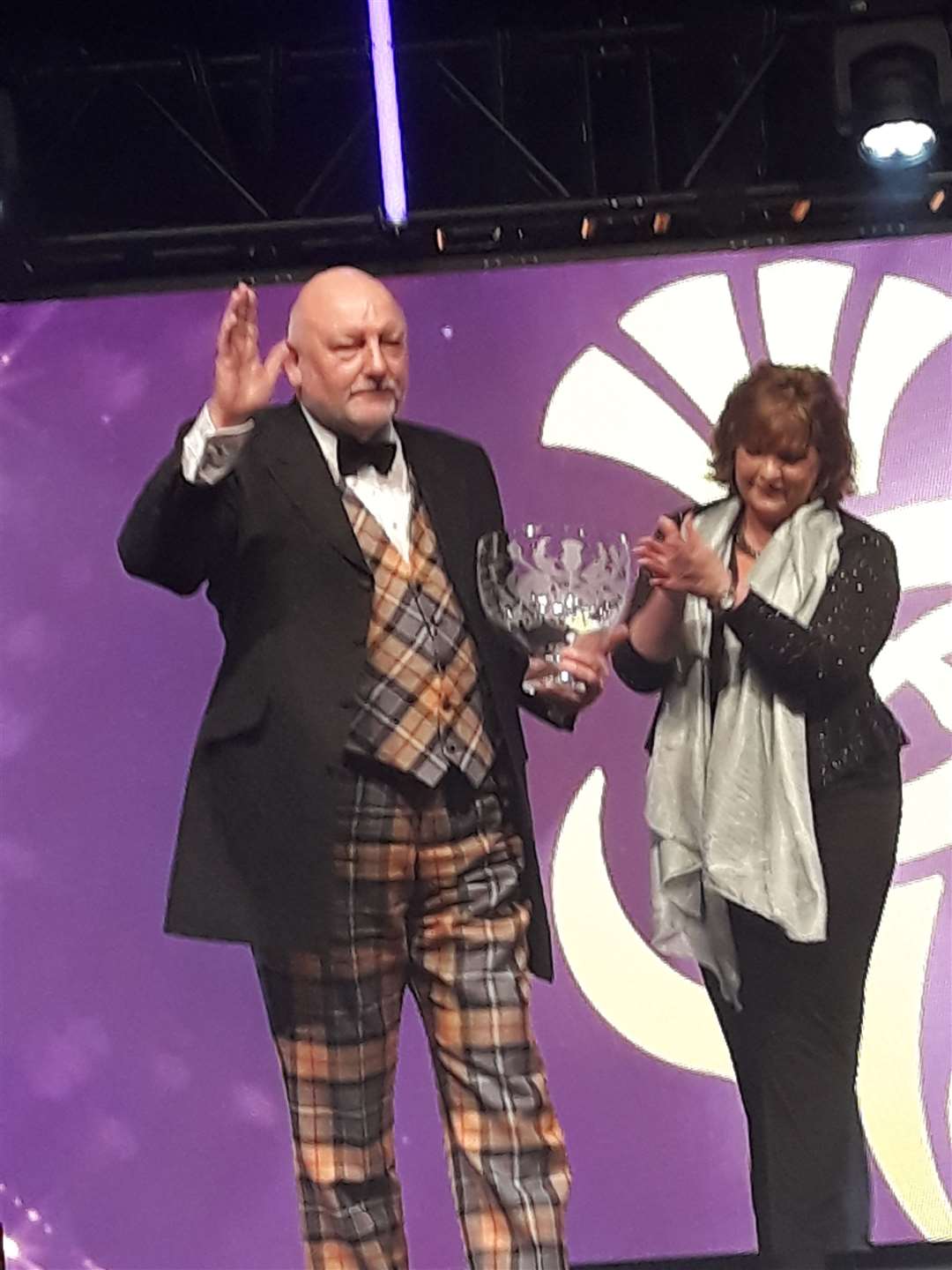 Willie Cameron receives the Silver Thistle Award at last year's national final.