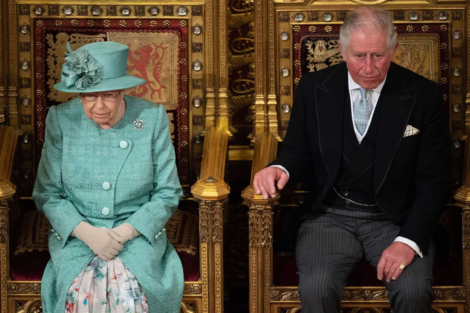 The Queen and the Prince of Wales sit in the House of Lords ahead of the State Opening of Parliament in December 2019 (Leon Neal/PA)