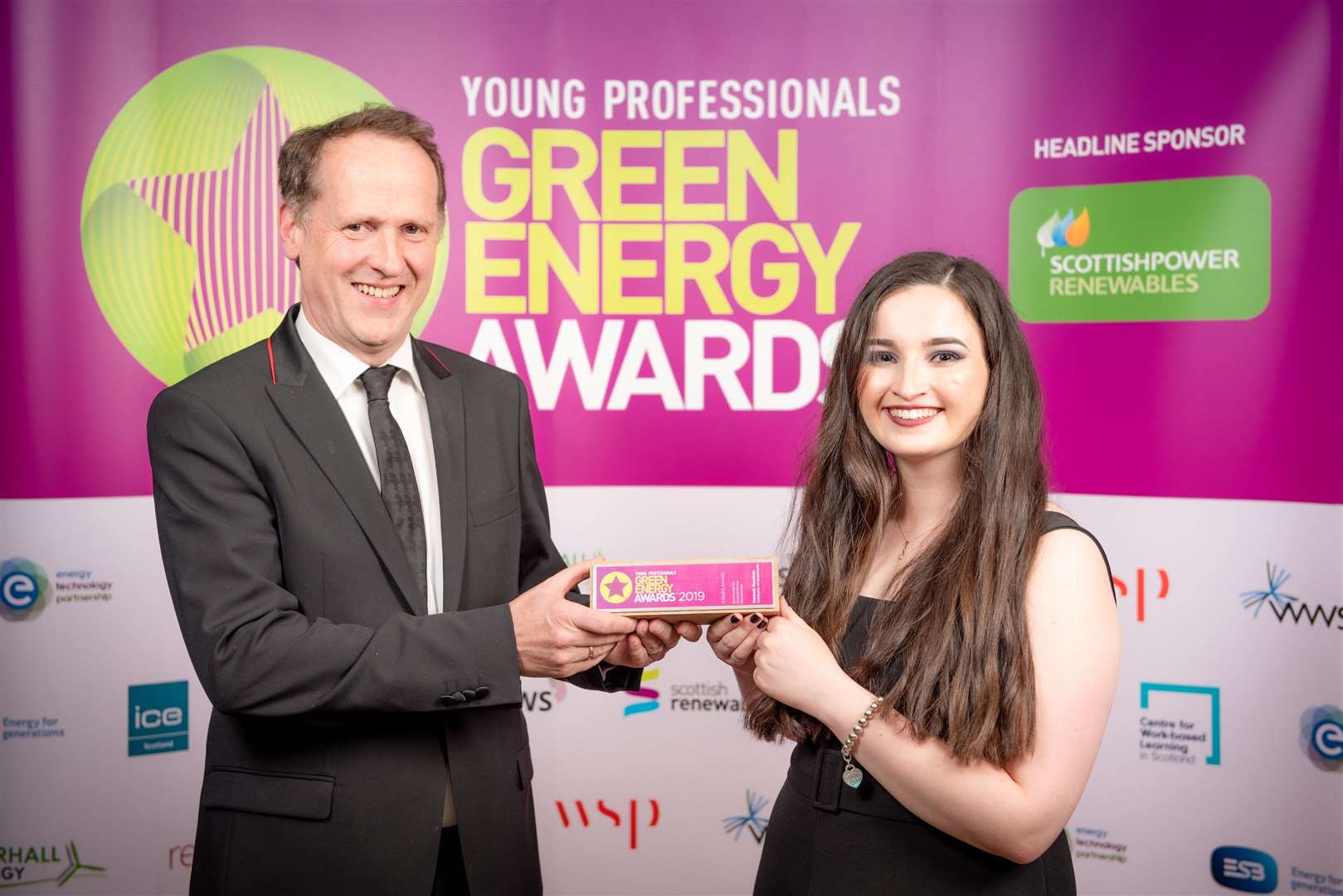 Hannah Houston received the judges award from Keith Anderson of ScottishPower Renewables.