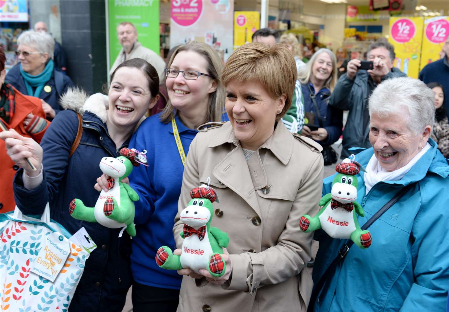 The First Minister gets a Nessie gift from staff at The Works shop in Inverness High Street. Picture: Gary Anthony. Image No.033268.