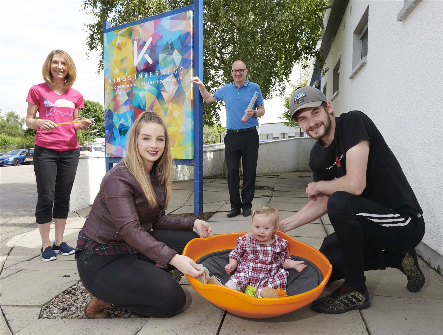 Gracey Wemyss with her parents Shannon and Mickey, Little Fishes co-ordinator Morgan Ball and Chris Dowling of Cairngorm Windows.