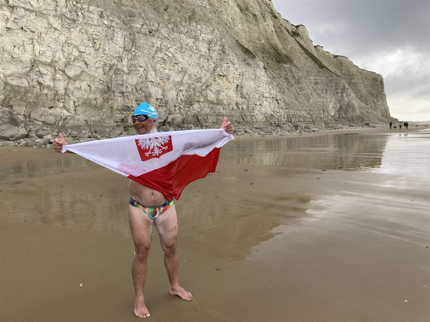 Piotr proudly displaying the Polish flag,