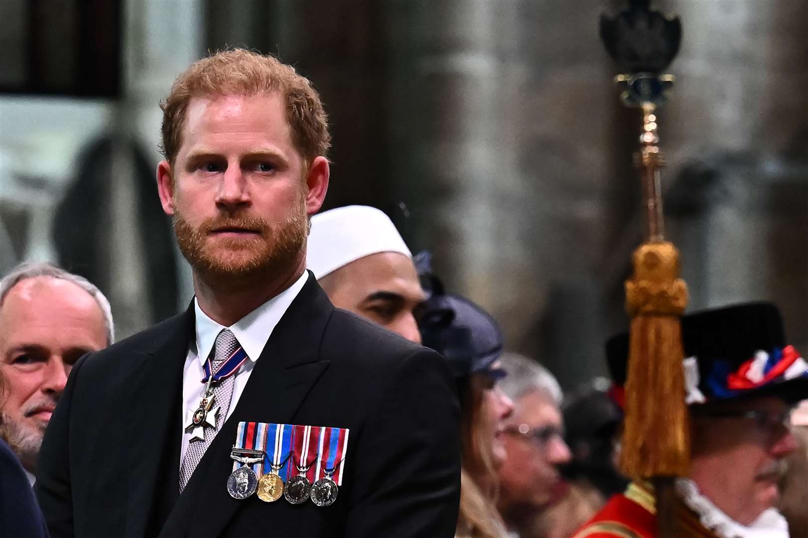 Harry returned to the UK to see his father the King crowned (Ben Stansall/PA)