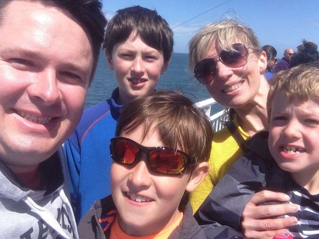 Sally Foulds with husband, Greig, and their three sons.