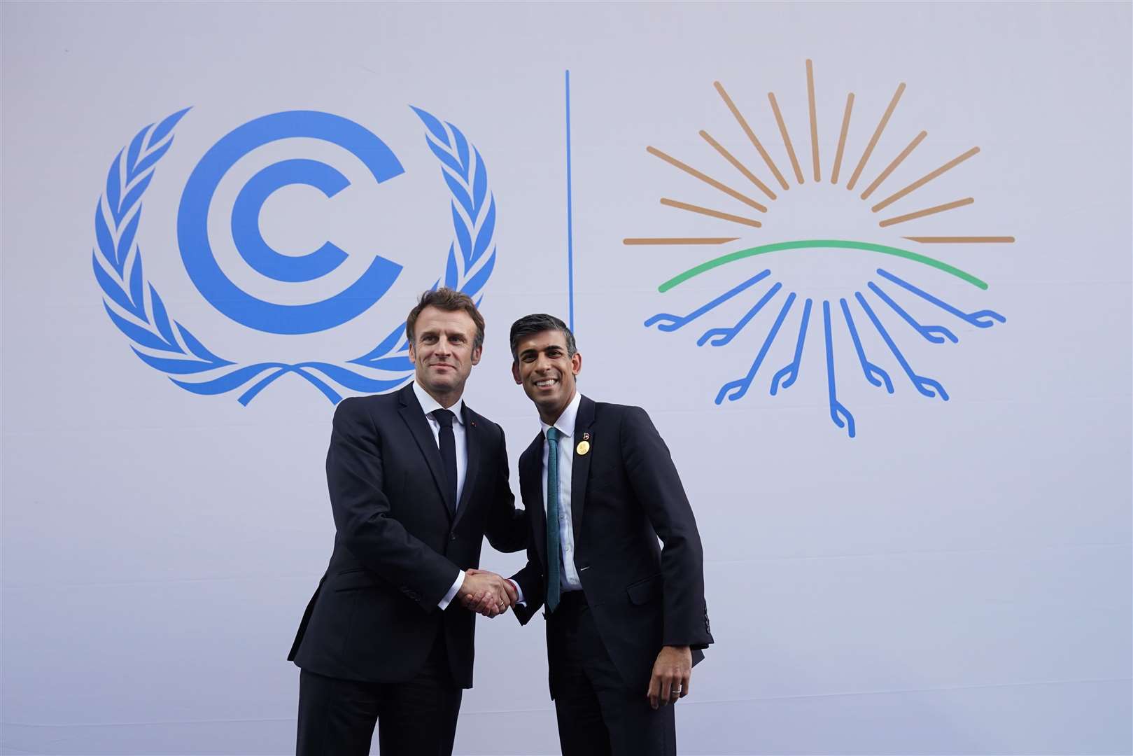 Emmanuel Macron and Rishi Sunak ahead of their bilateral meeting during the Cop27 summit (Stefan Rousseau/PA)