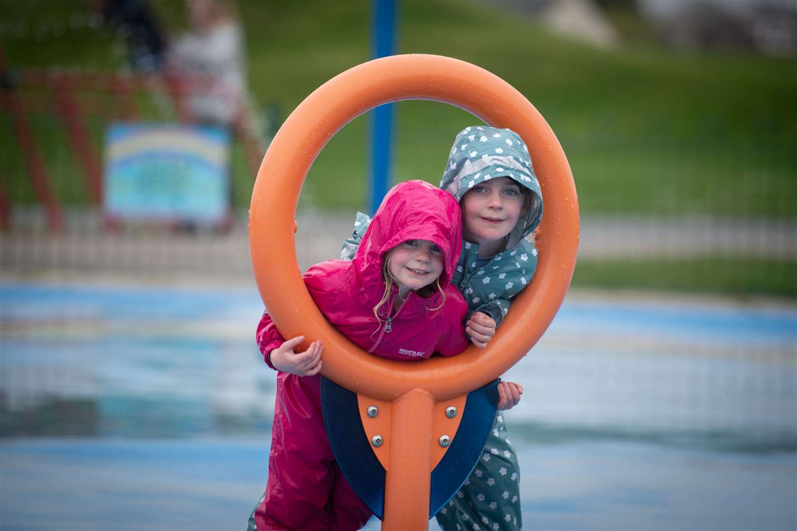 Florence and Holly Henderson having fun in the splashpad. Picture: Callum Mackay.