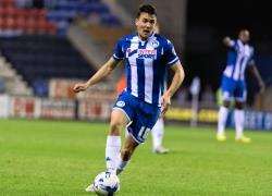 Tim Chow in action for Wigan Athletic against Millwall last season.
