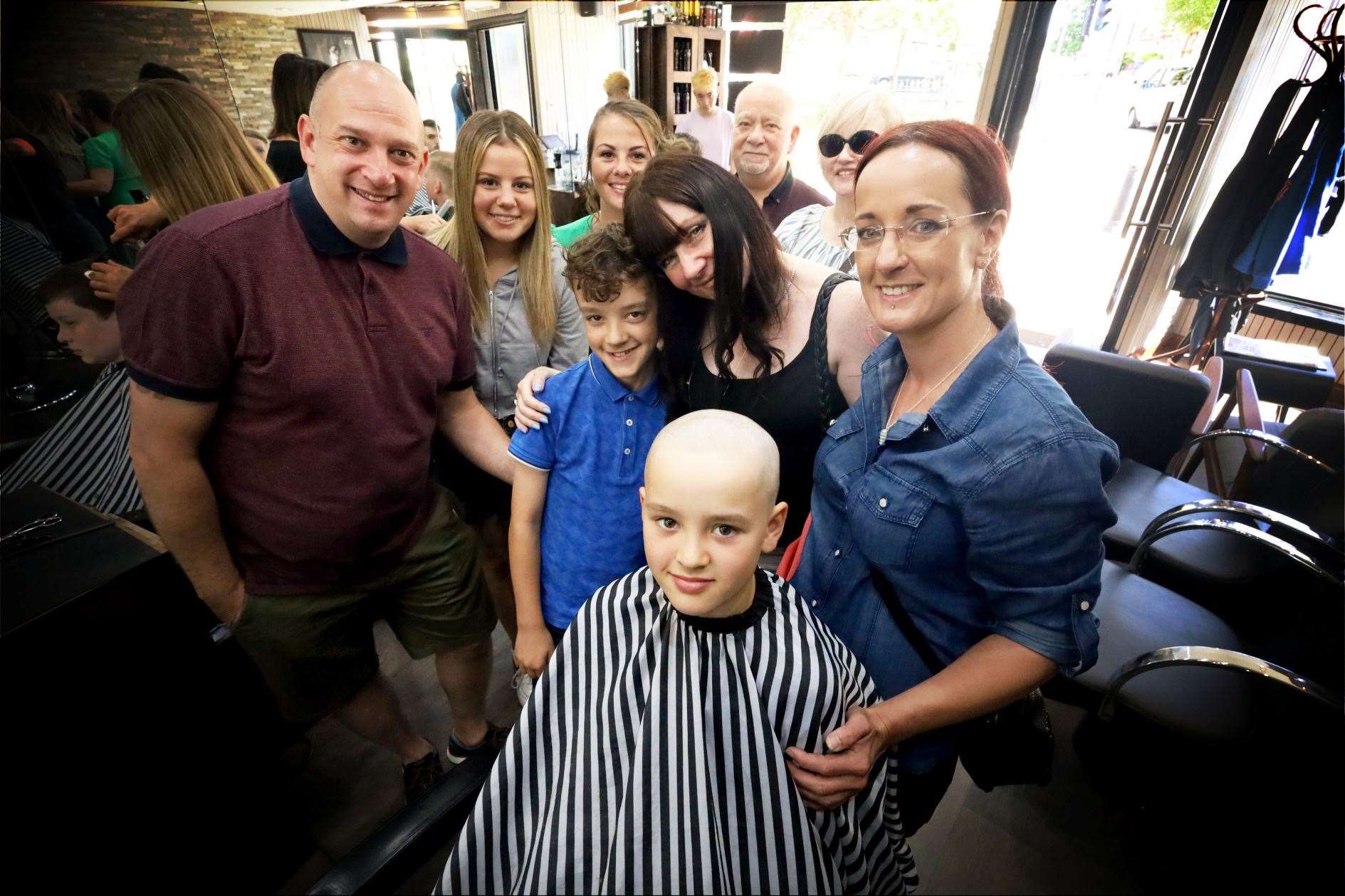 After: Sam Maclennan and his family. Picture: James Mackenzie
