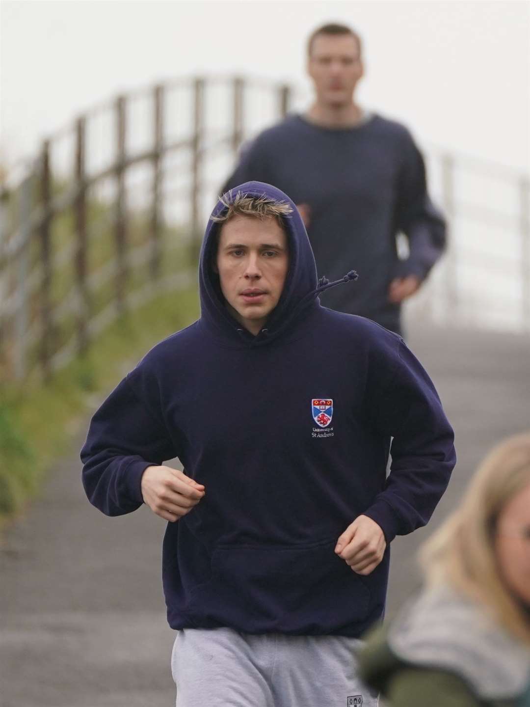 Actor Ed McVey jogging in St Andrews during filming for the next series of The Crown (Andrew Milligan/PA)