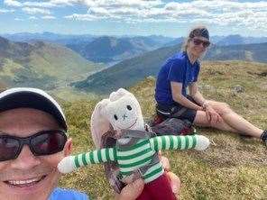 Keen hiker Dr Paul Fettes with wife Heidi Fettes and Rabbie the Rabbit on South Shiel Ridge.