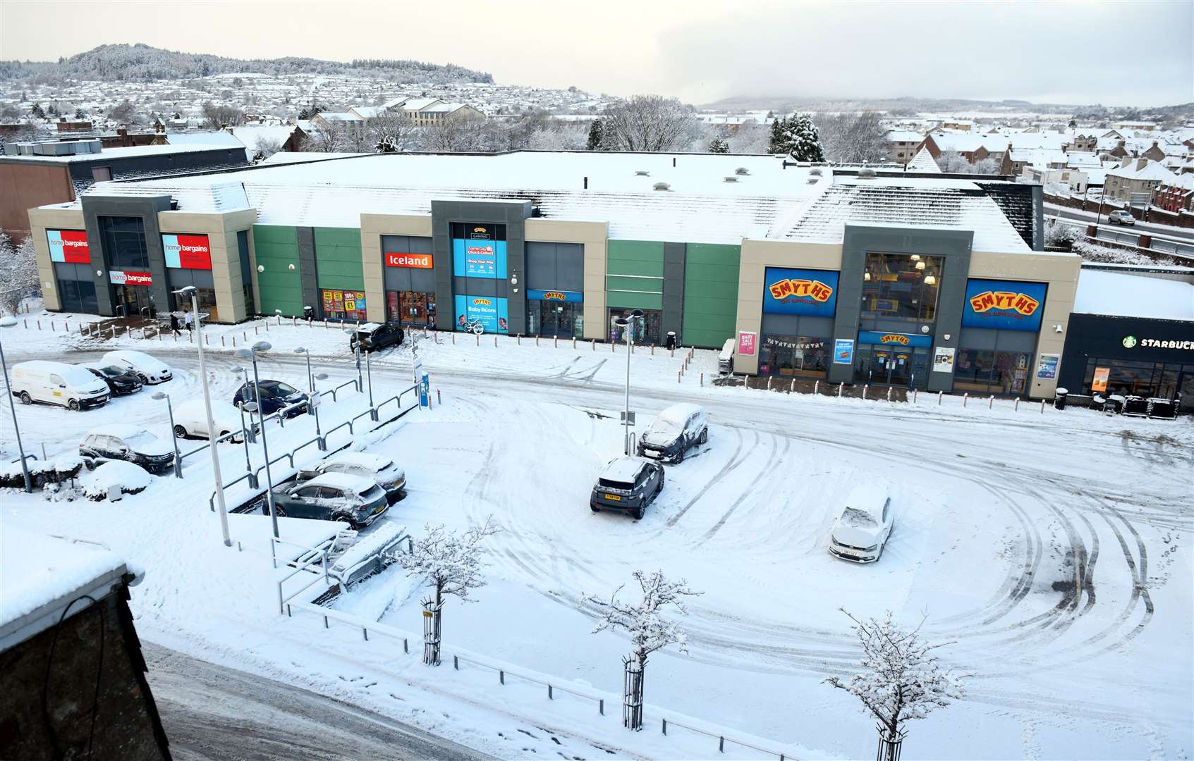 Home Bargains, Iceland and Smyths Toy Superstore in the snow. Picture: James Mackenzie