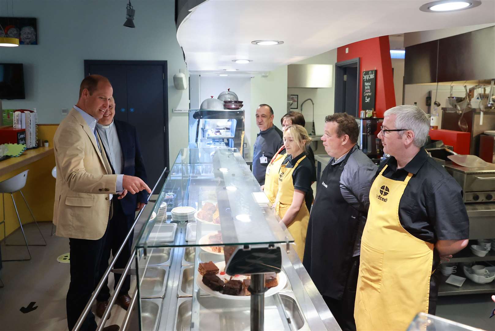 The Prince of Wales meeting members of the of at the Refresh Cafe during a visit to the East Belfast Mission at the Skainos Centre, Belfast, as part of his tour of the UK to launch a project aimed at ending homelessness (Liam McBurney/PA)