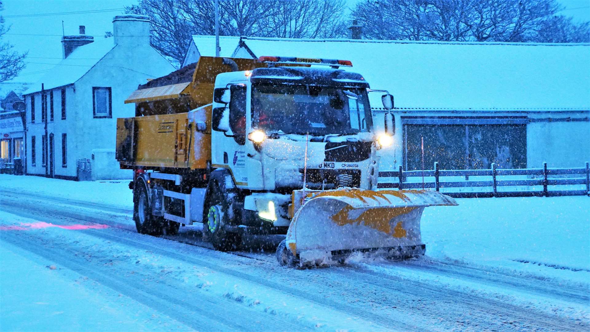A council snow plough in action.