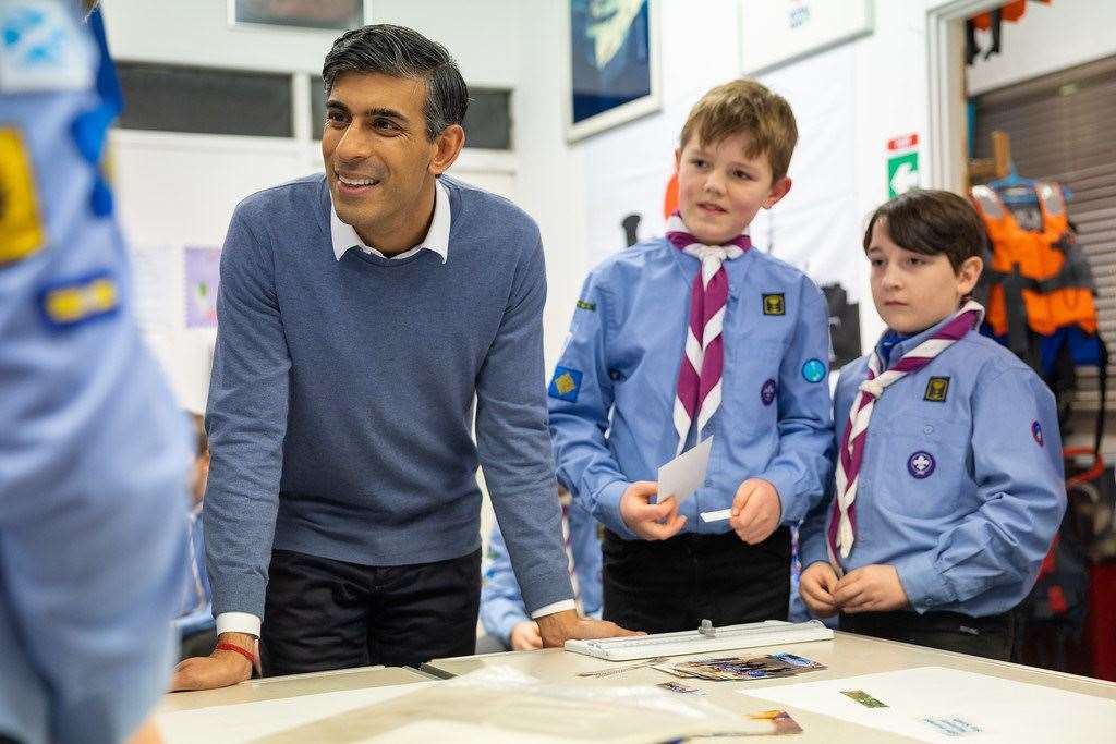 12/01/2023. Inverness, United Kingdom. The Prime Minister Rishi Sunak meets a sea scout group in Inverness and toasted marshmallows with them over an open fire. Picture by Simon Walker / No 10 Downing Street