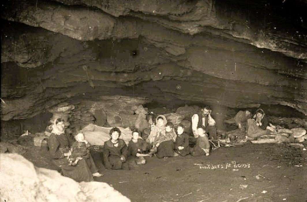 The photo is titled 'Tinklers at Home' and shows an extended family of travelling tinsmiths at home in the cave known as 'Kunk's Hole' on the north coast of Caithness between Ham and Brough in the Dunnet parish c.1900. Picture: The Johnston Collection/Wick Society.