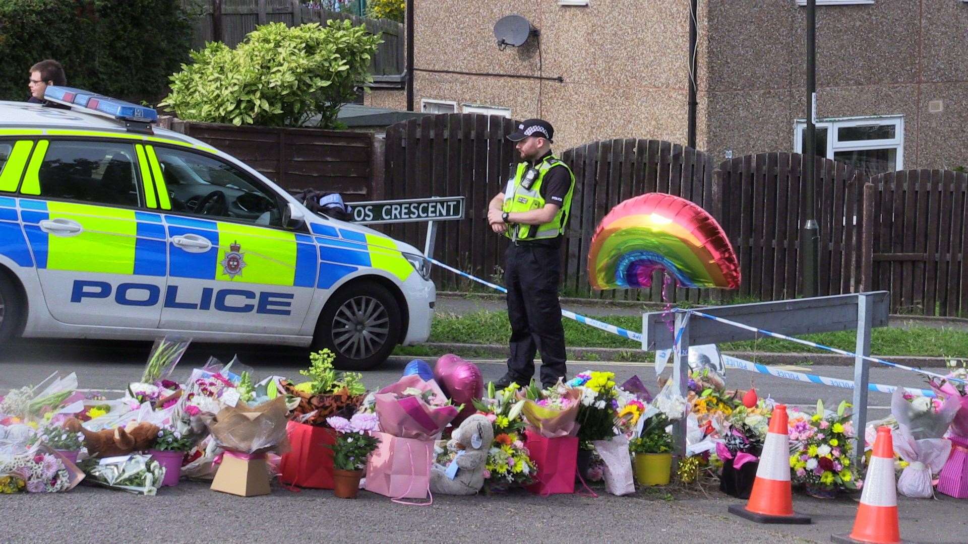 Flowers have been left near the scene in Chandos Crescent (Dave Higgens/PA)