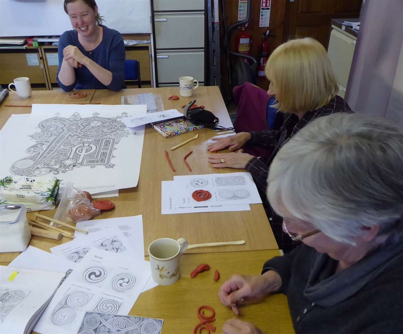 Volunteers working on pieces for the animation that will light up Fortrose Cathedral.