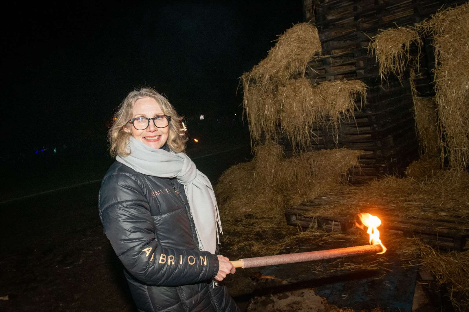 Inverness Provost Glynis Campbell Sinclair lights the bonfire. Picture: Callum Mackay.
