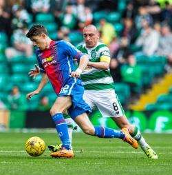 Ryan Christie battles against Scott Brown in a clash against Celtic earlier this month