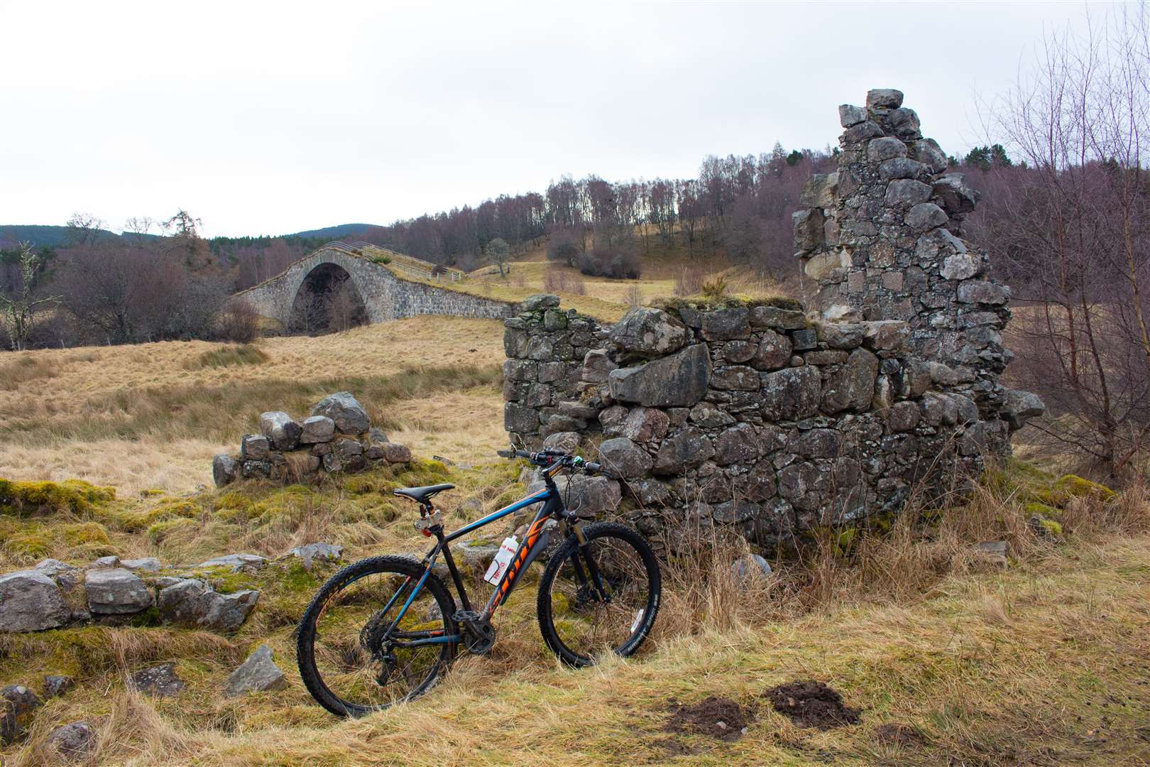 Sluggan Bridge, seen from the nearby ruin, is part of the National Cycle Network.