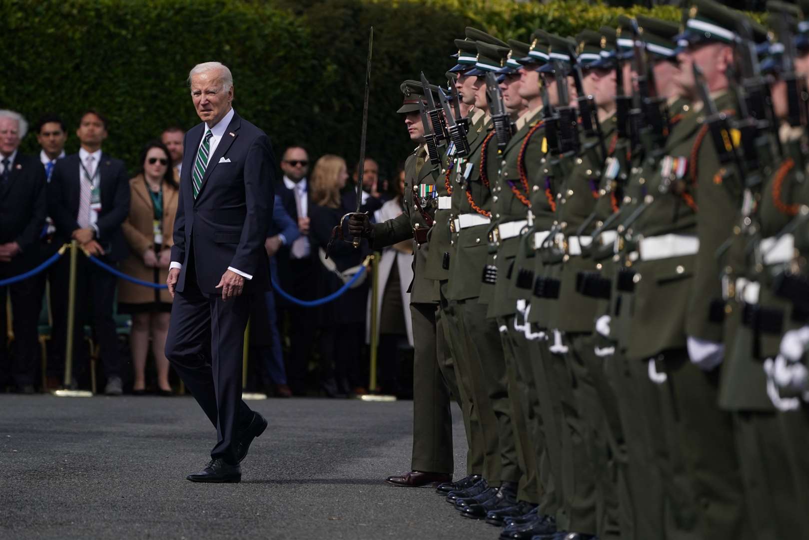 Joe Biden was greeted with a guard of honour (Brian Lawless/PA)