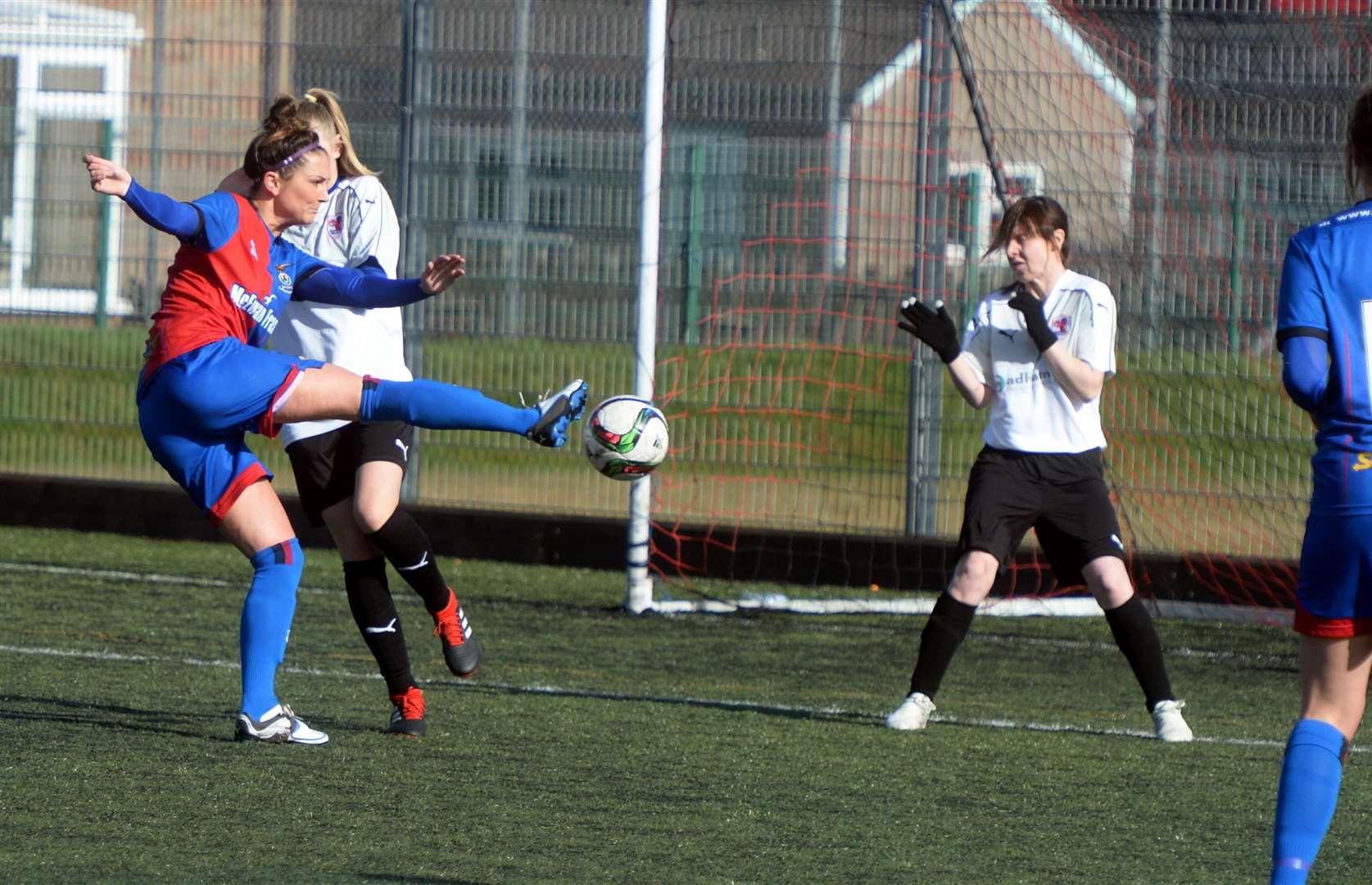 Womens Caley Thistle vs Raith.. Caley Thistle player Natalie Bodiam puts in goal number one past Raith defender Fern Westland..Womens Caley Thistle vs Raith.Picture: Gair Fraser. Image No. 043496..