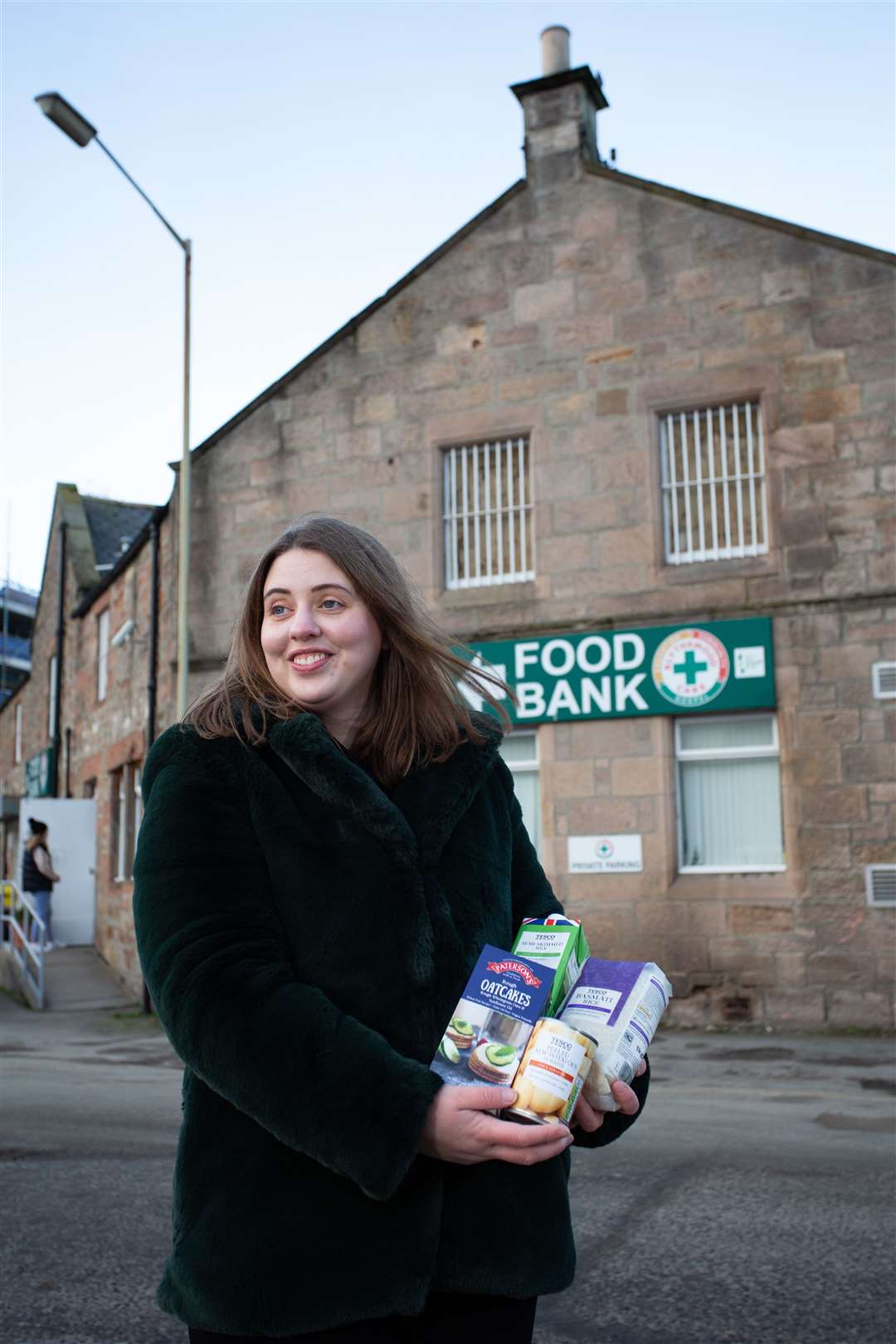 Ledingham Chalmers Inverness-based senior associate Sine Mackay delivering provisions to the Highland Foodbank. Picture: Alison White