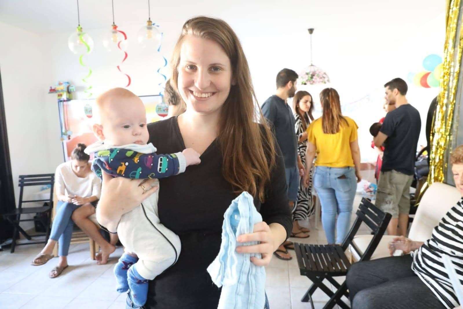 Ofri Bibas Levy’s sister-in-law Shiri Silberman Bibas with her son Kfir, who is missing along with her husband Jordan and other son Ariel, four (Family handout/PA)