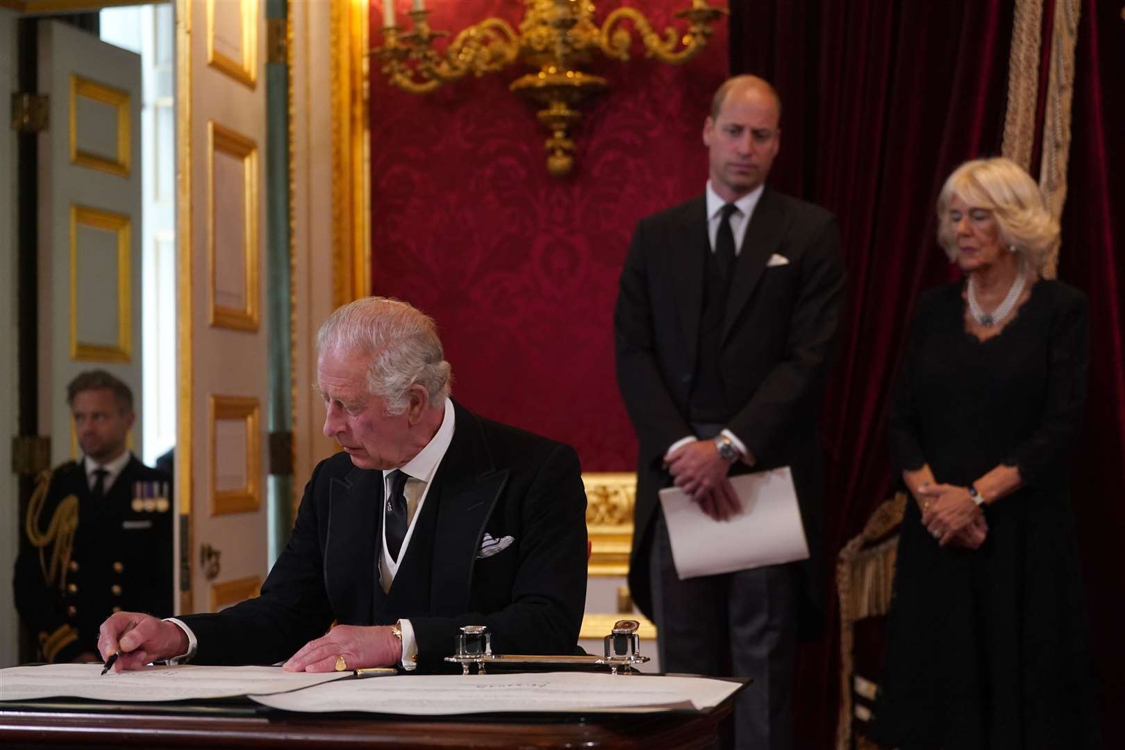 King Charles III signs an oath to uphold the security of the Church in Scotland during the Accession Council at St James’s Palace, London (Victoria Jones/PA)