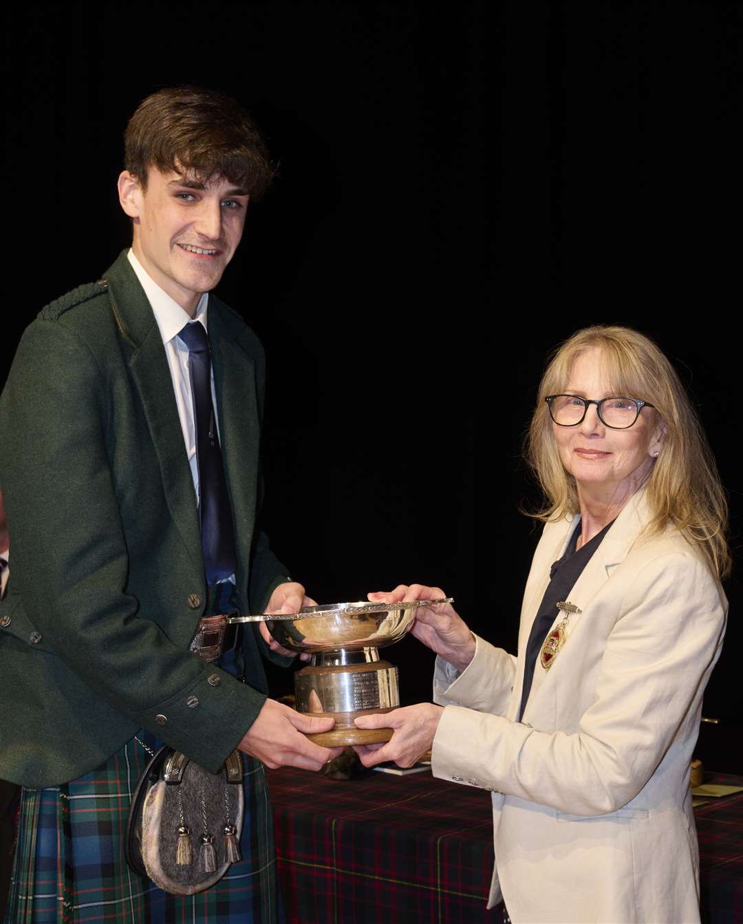 Glynis Campbell-Sinclair (the Provost of Inverness) with Andrew Ferguson who won the1st Sandy Grant Gordon Challenge Cup at the Northern Meeting 2022 which was held at Eden Court in Inverness.