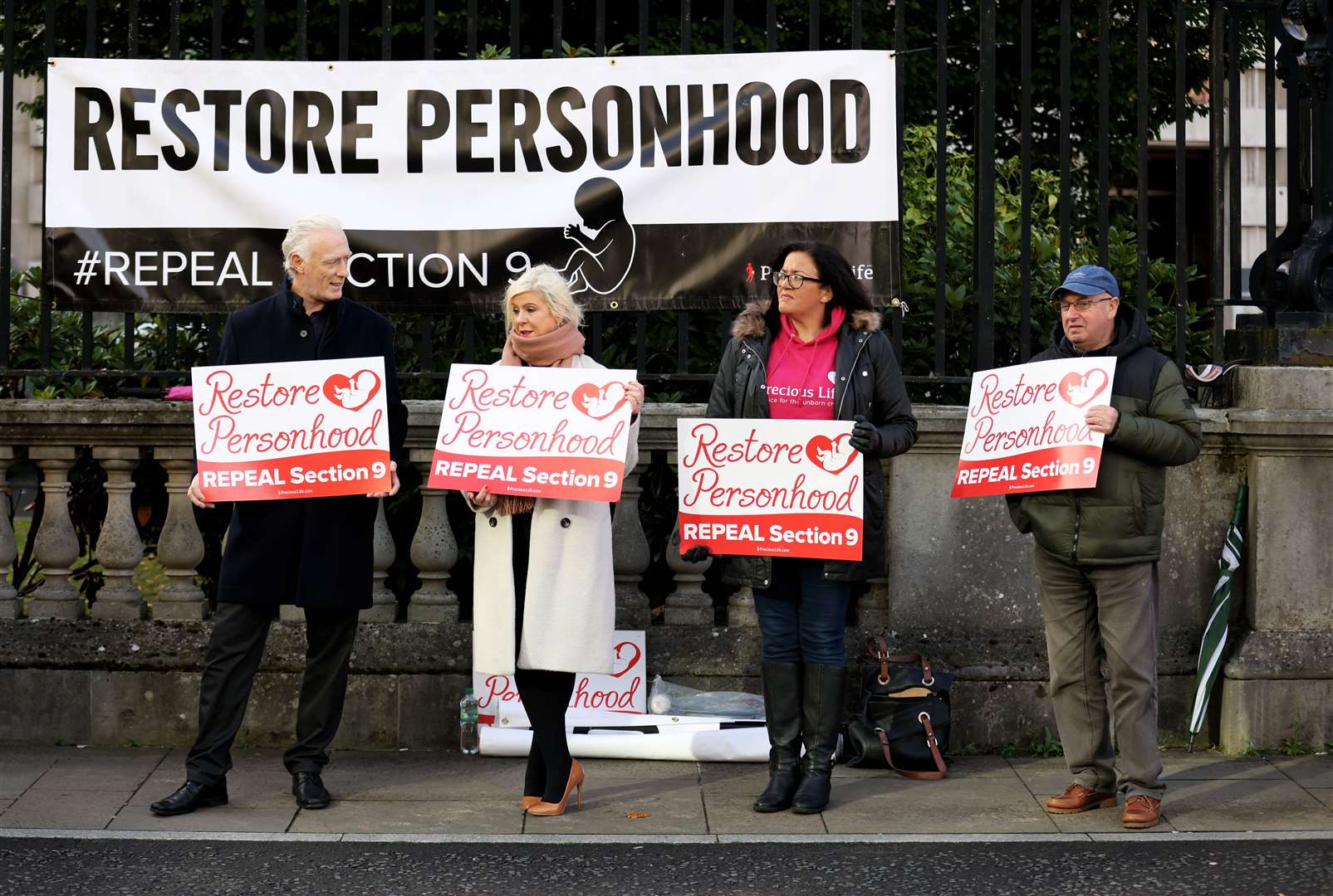 Anti Abortion and pro life members hold a protest outside Belfast High Court earlier in October (Peter Morrison/PA)